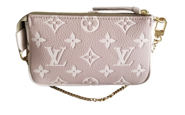 Louis Vuitton Pochette Accessory Monogram Empreinte Leather Wristlet Bag
